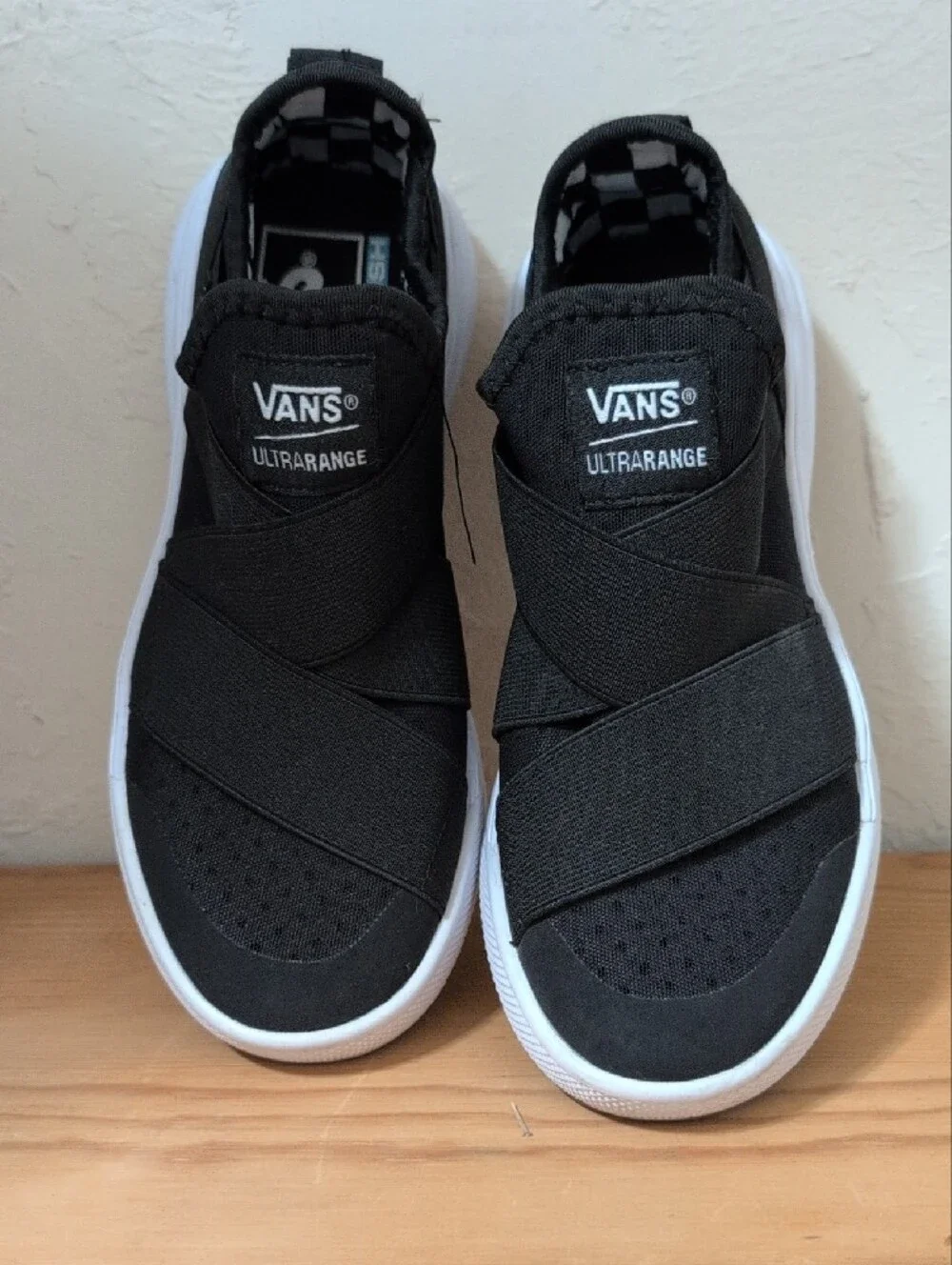 Vans Kids Ultrarange Slip-On Sneakers in Black and White 3.5 Men's / 5 Women's